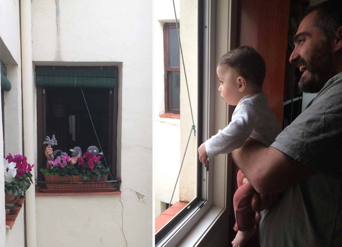 León in his father’s arms watching from their window the puppet show that his neighbours put on for him each afternoon.