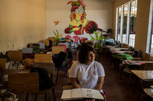 Geraldine Suzette Matute, 16, sits in her classroom. She suffered from repeated bullying
