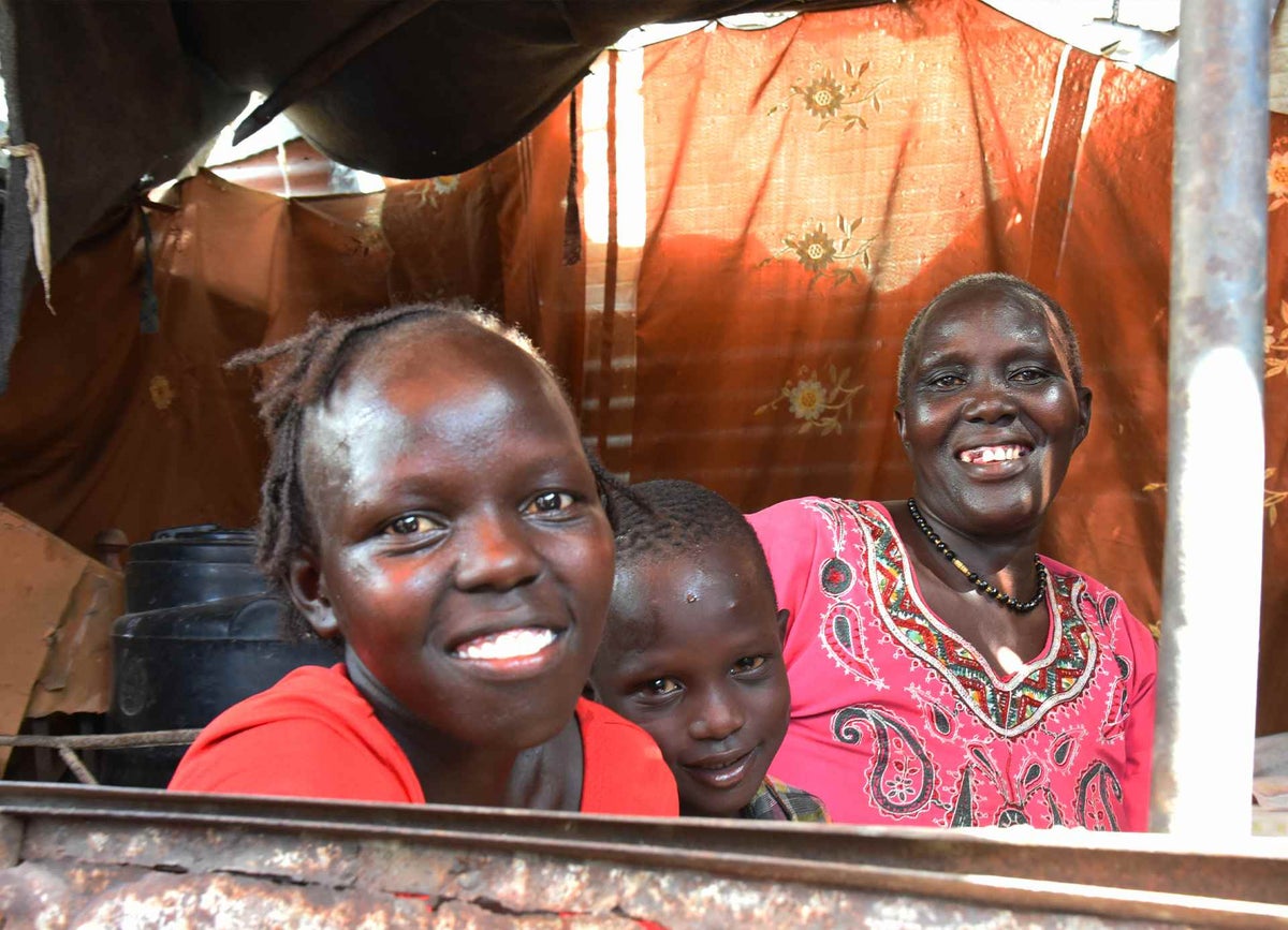 Ferdos, Chogi and their mother, six months after they were reunited. 