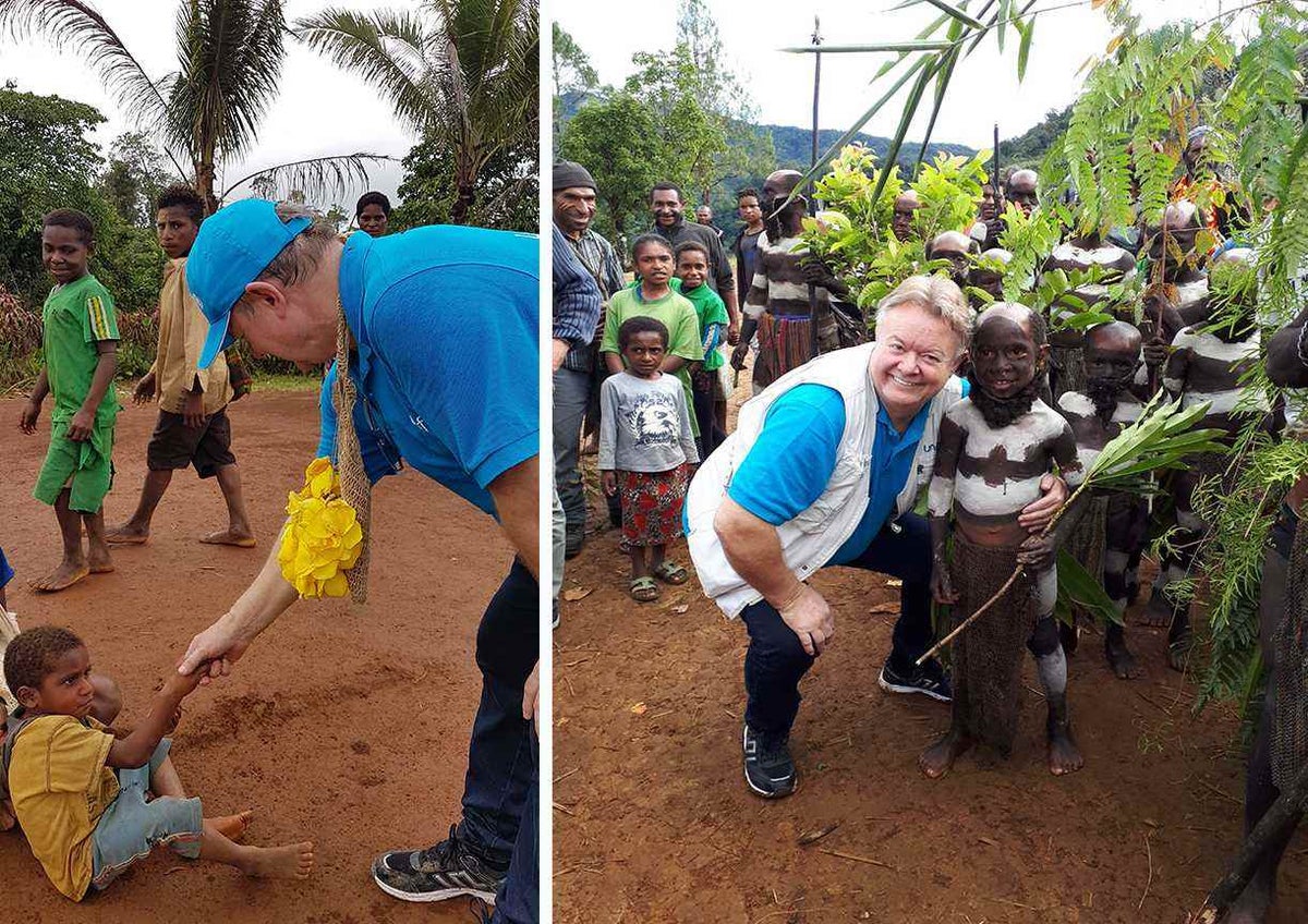 David talking to locals children in PNG