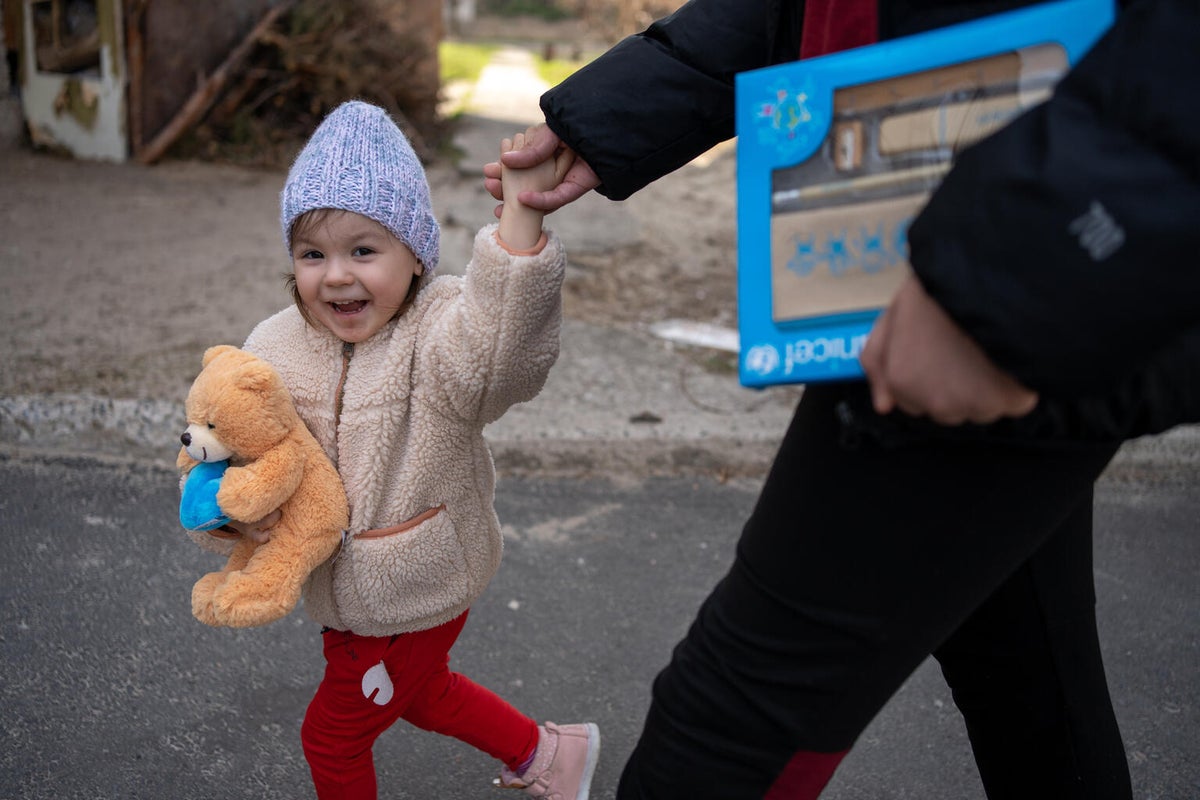 A young toddler going for a walk outside