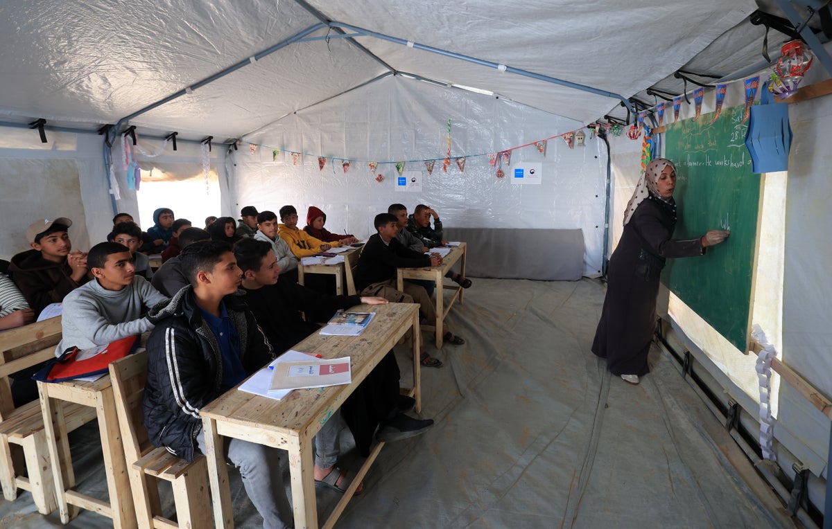 Children are continuing their education in a UNICEF-supported temporary learning centre, in a safer space designed to help them learn, play, and rebuild routines.