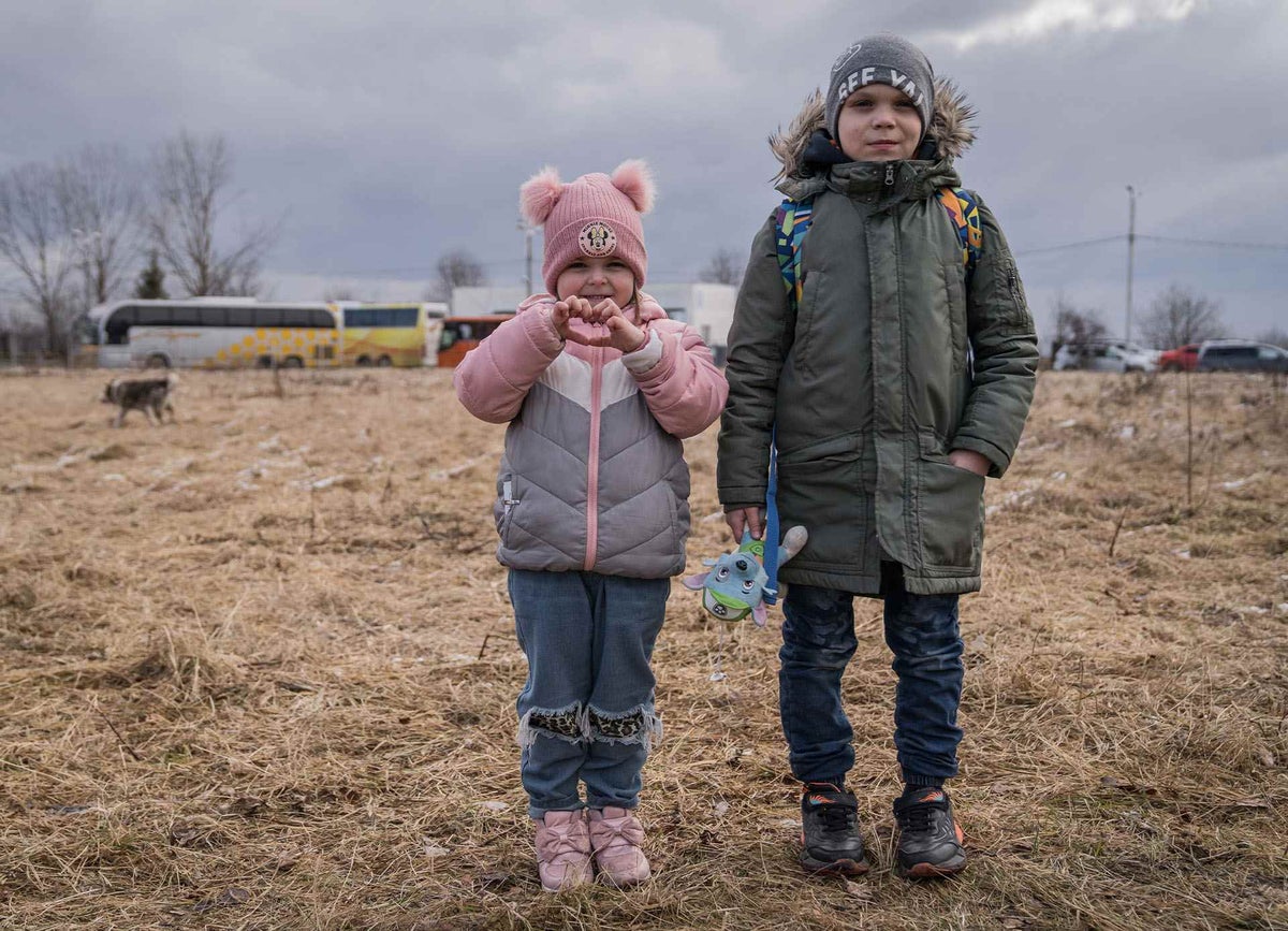 Children standing in a field