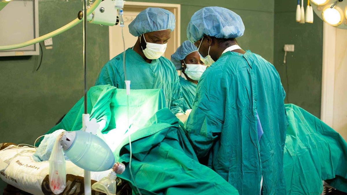 Surgeons operating