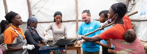 Women producing eco friendly charcoal