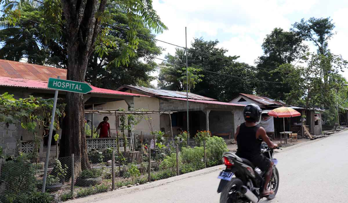 A sign points the way to a hospital in a remote district of Timor-Leste