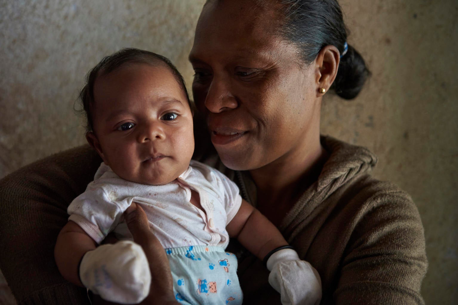 Mother nursing her baby in Timor Leste 