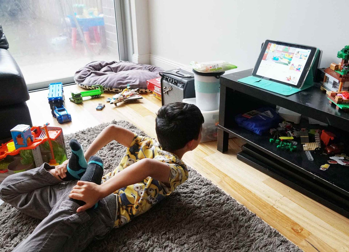 Zac takes part in an online yoga course for kindergarten students