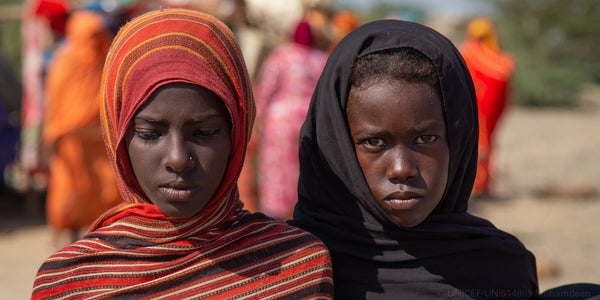 Two children from Sudan who have been displaced during conflict.