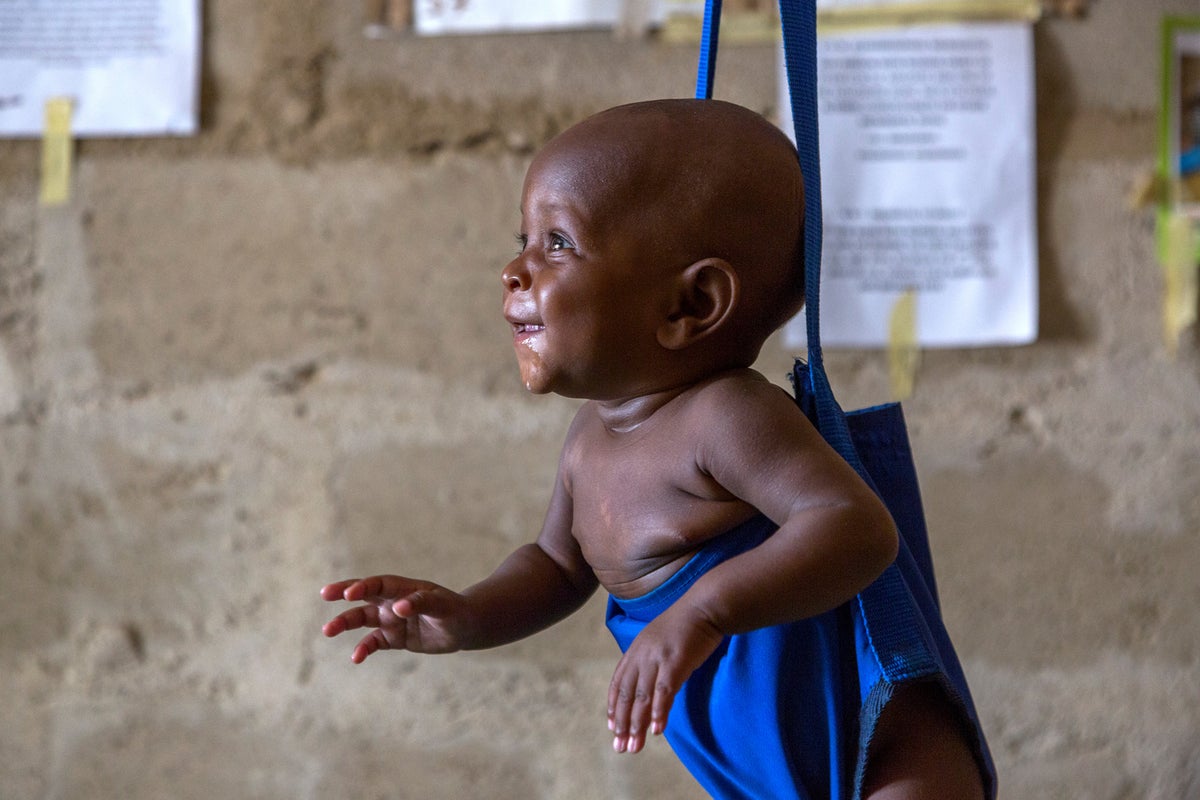 A baby being weighed in a Nigerian health centre