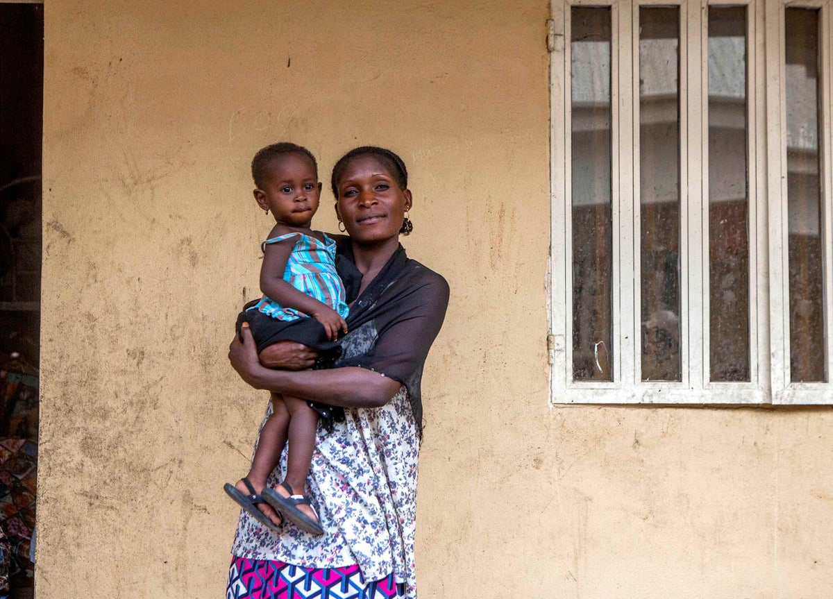 Maryamu holds her daughter Hyladan in a camp for internally displaced people in Adamawa, Nigeria.