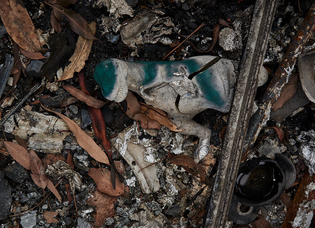 A child's toy is among the burnt remains of the fires that hit Clifton Creek, VIC. © UNICEF Australia/2020/Simons
