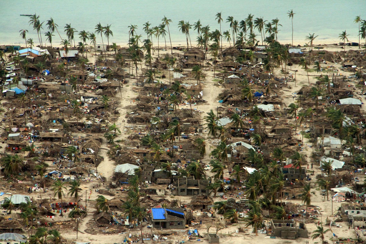 An aerial image of a coastal section devastated by weather 