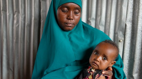 Somalian mother and child looking at camera