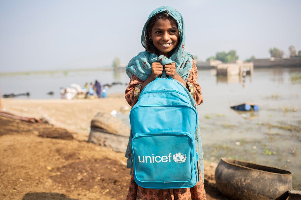 Eight-year-old Ameer goes to school for the first time since UNICEF established a temporary learning centre in her area, which was heavily impacted by the 2022 floods.