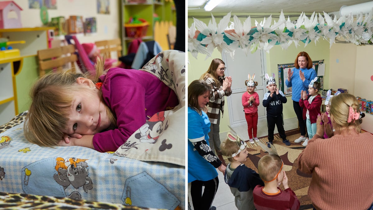 Little children play with their teachers in an underground preschool in Ukraine.