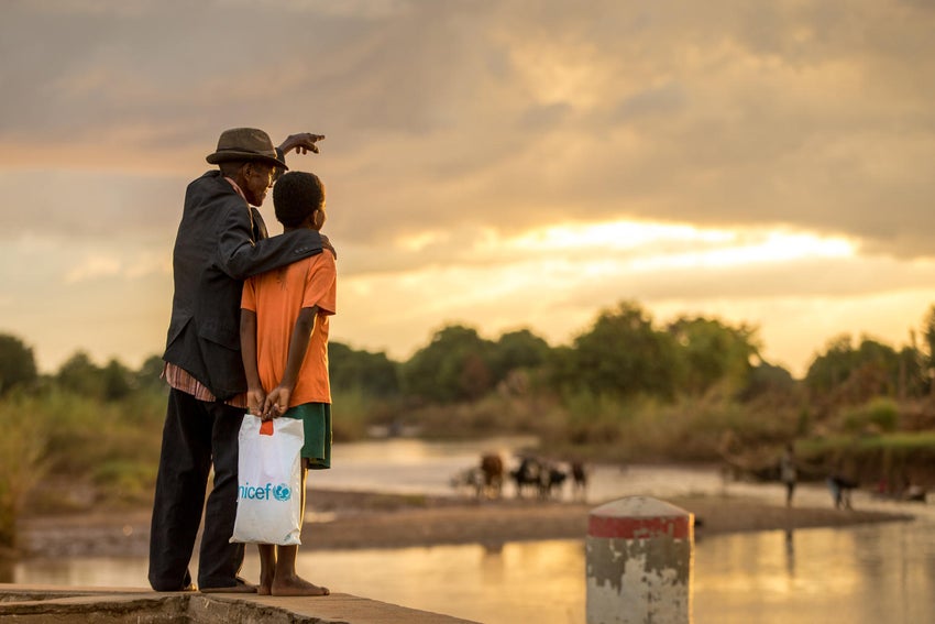 A man and a child in Madagascar looking at the horizon