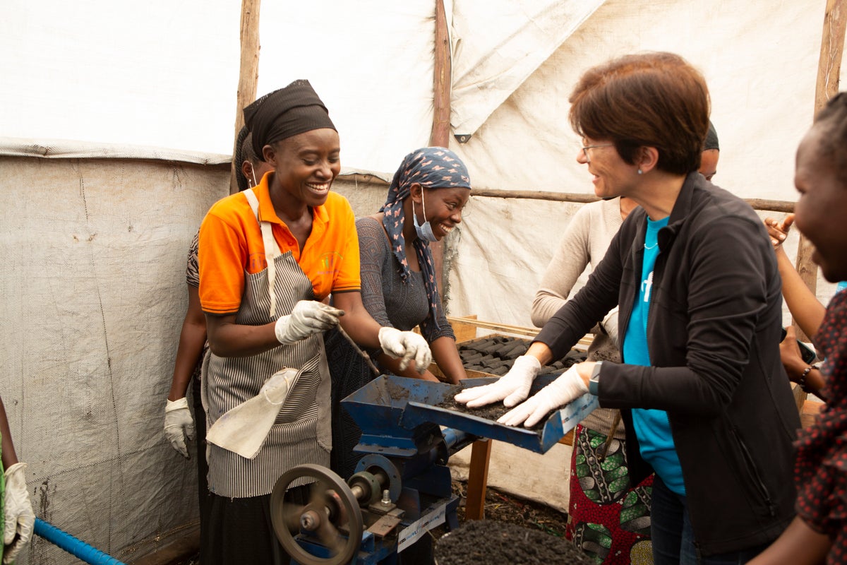 Woman producing eco-friendly charcoal