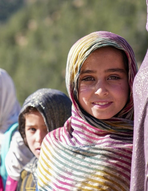 A girl in Afghanistan looks at the camera