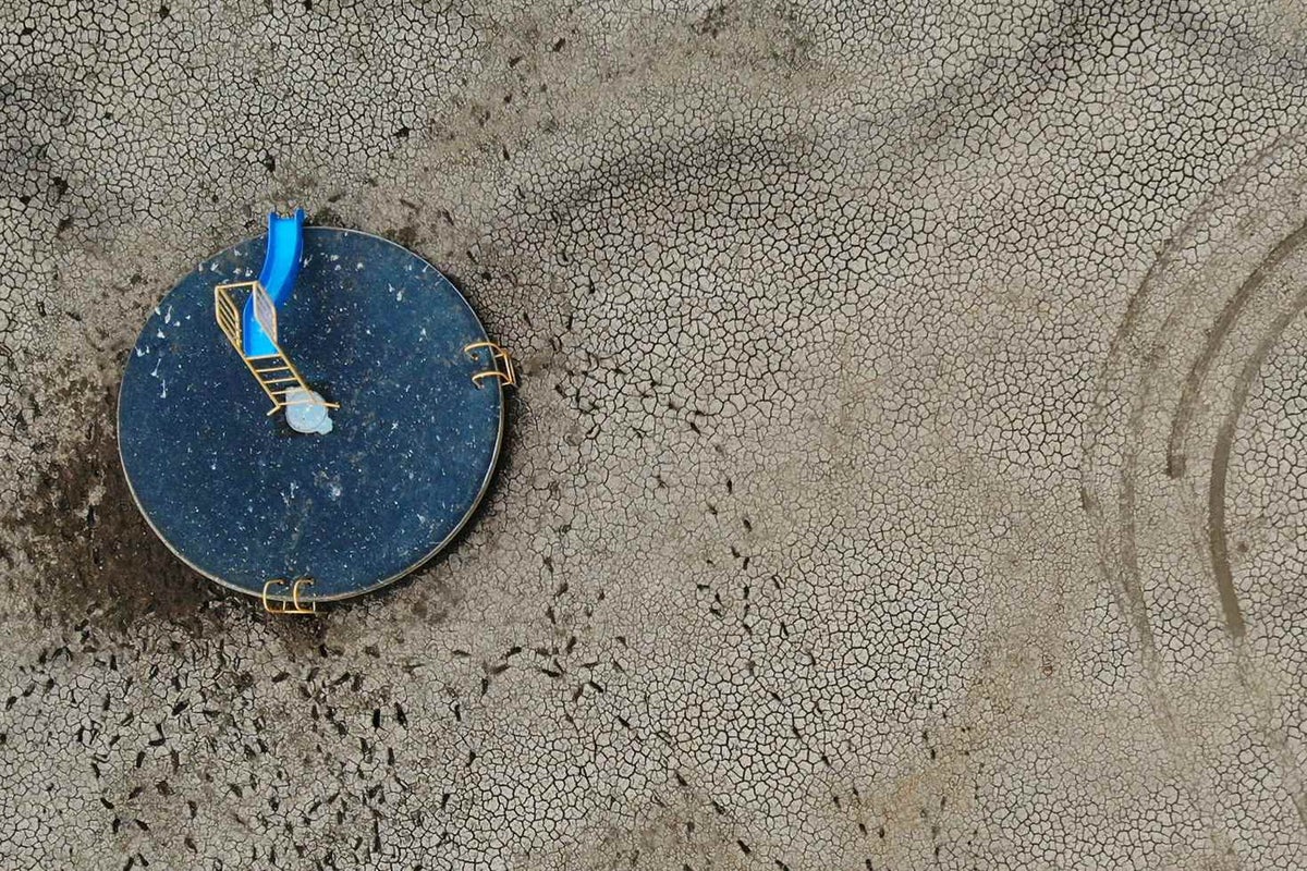 Children once swam in Lake Keepit, on the outskirts of Gunnedah, but now there is no water left.