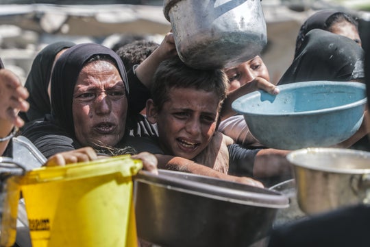  A young child at a food distribution site in Gaza.