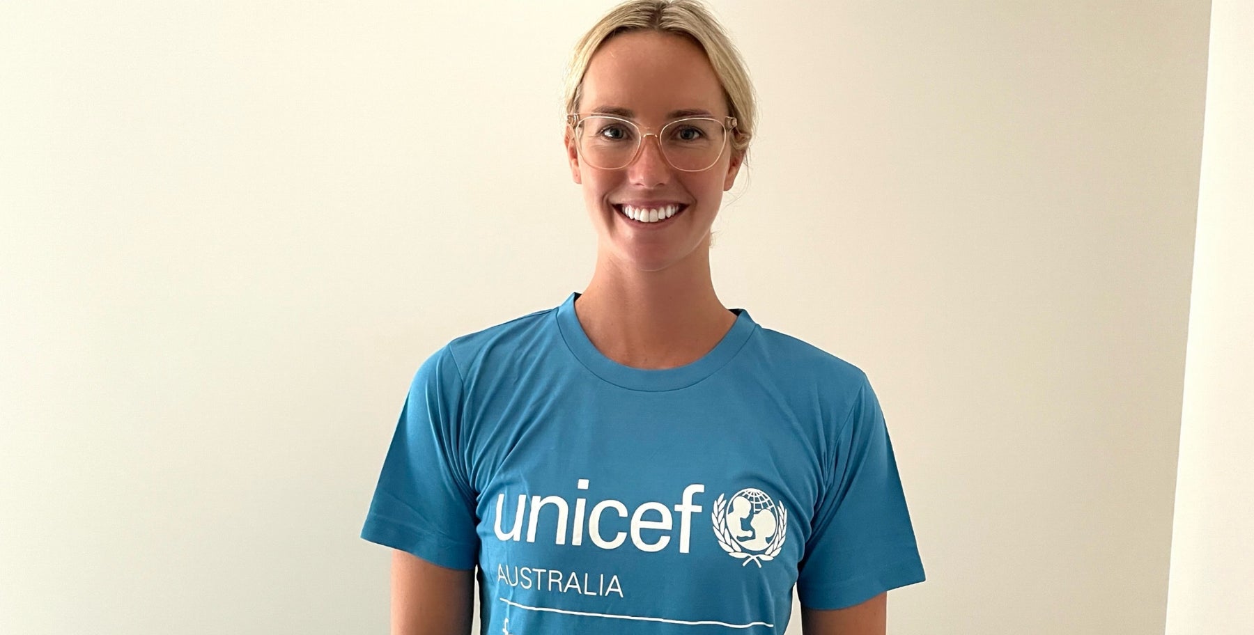Ambassador Emma McKeon in UNICEF Australia shirt 