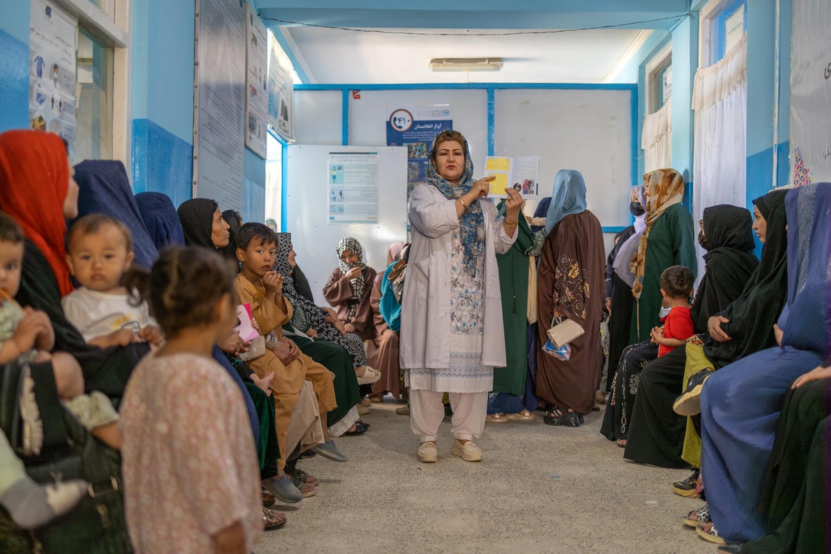 At a UNICEF-supported health clinic, Nasrin provides guidance and health education to mothers, women, and girls.