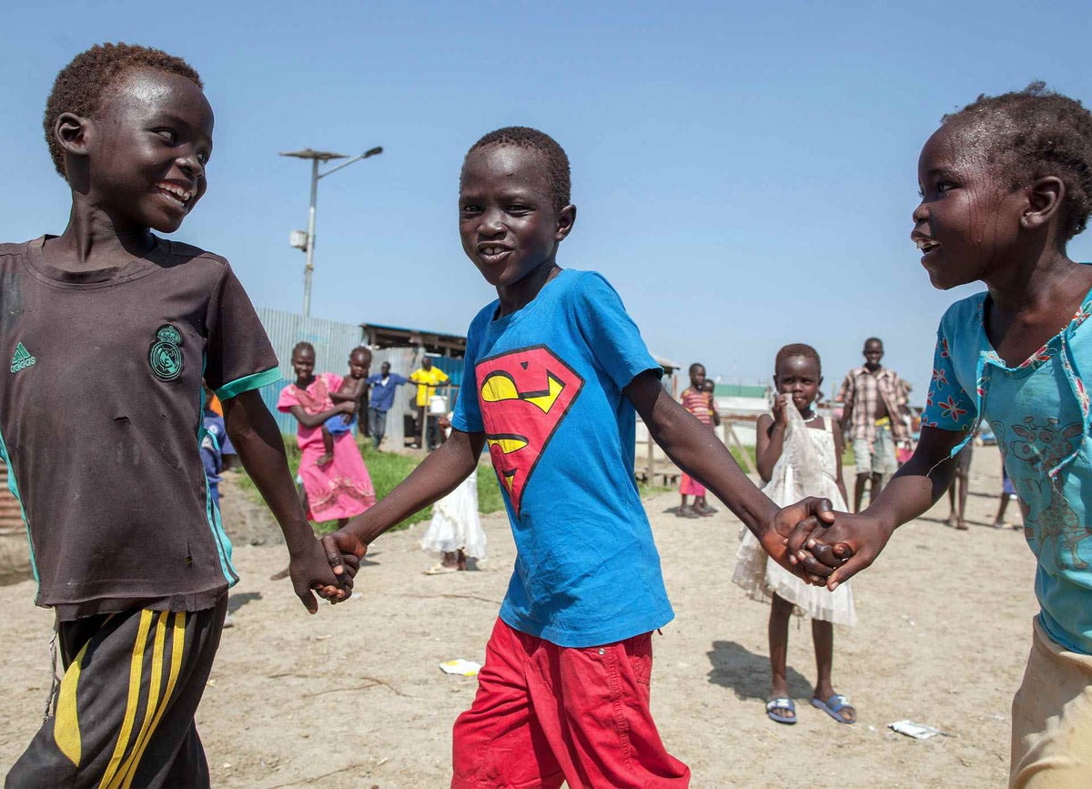 Ten-year-old Chogi plays with friends near his home in a protection site in South Sudan. 