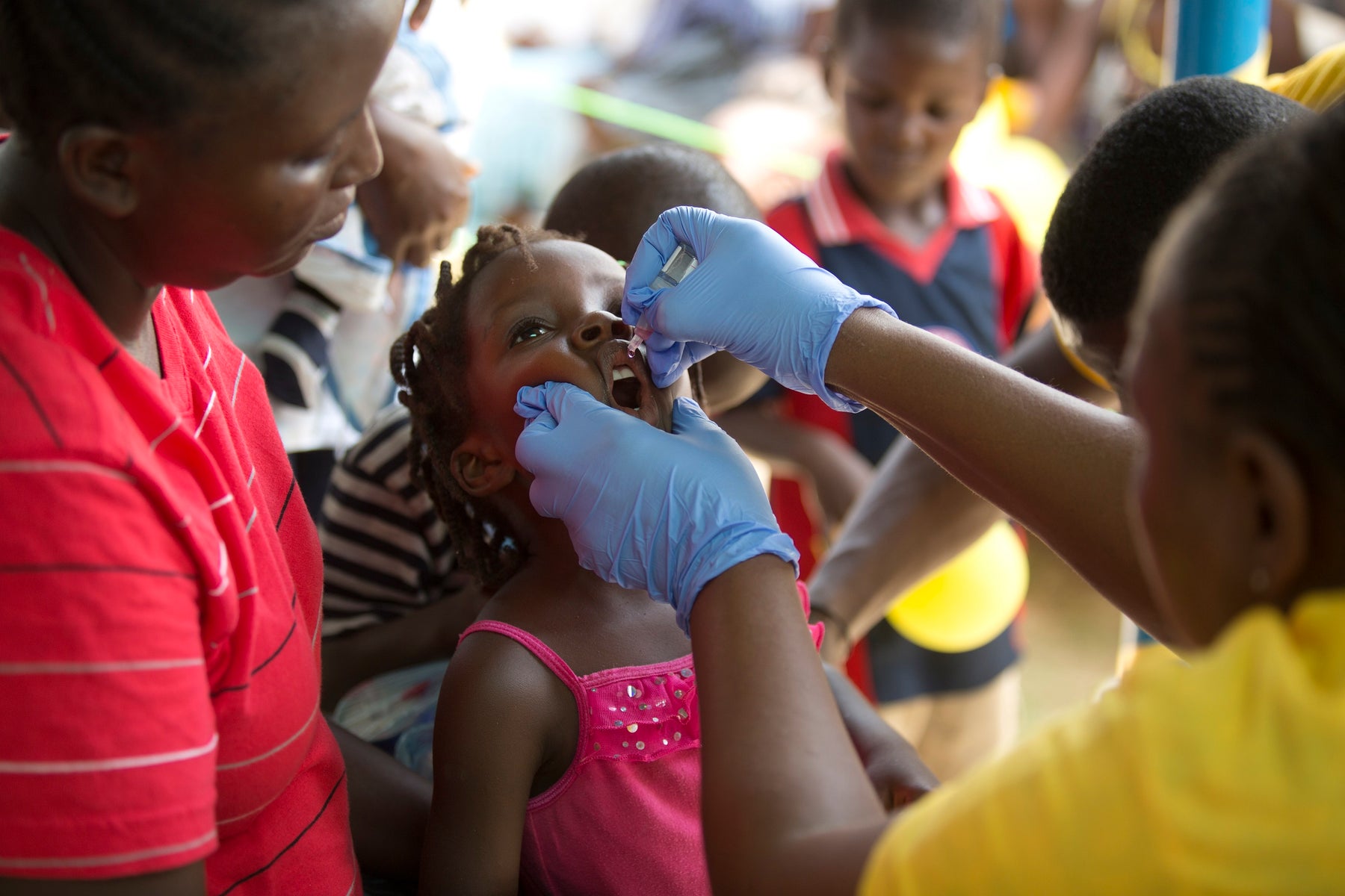 Girl receives Polio vaccine