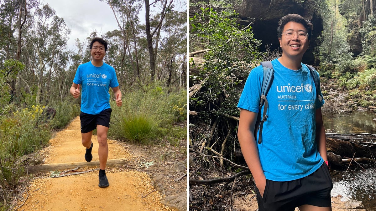 A young man in a blue UNICEF shirt on a run. 