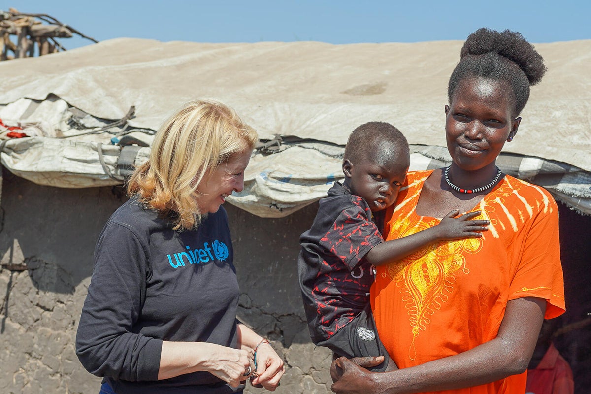 UNICEF Executive Director Catherine Russell meets with three-year-old boy and his mother during her visit to South Sudan