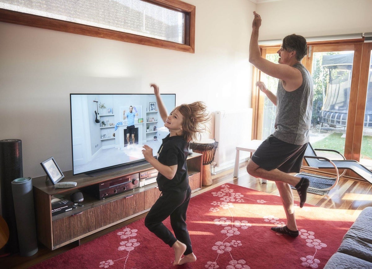 Daughter and father doing exercise during lockdown