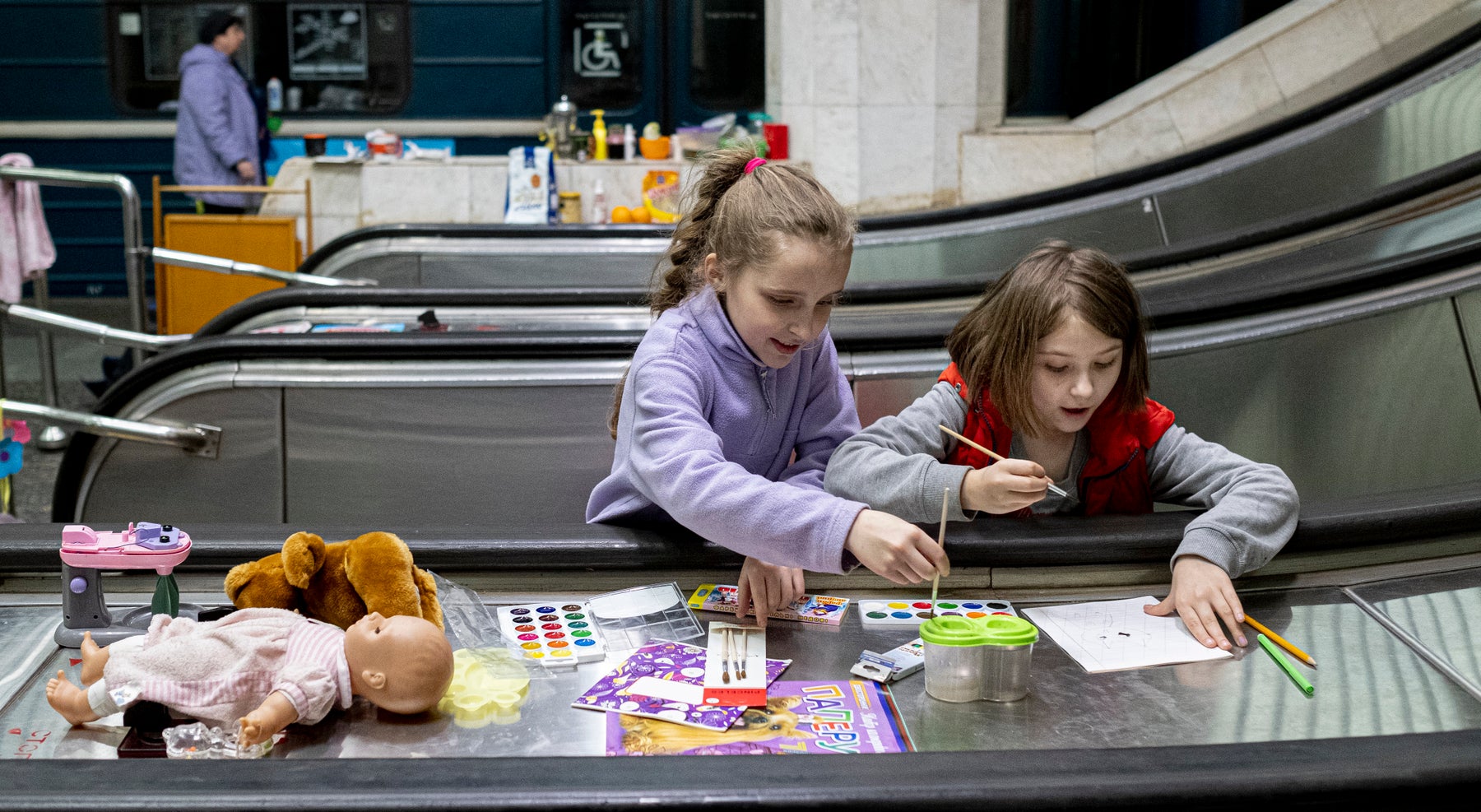Children playing in underground train station