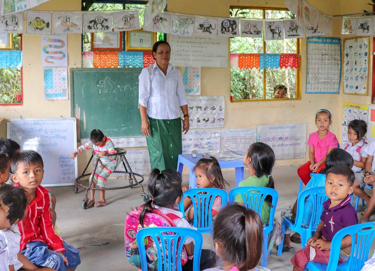 Seng teaches children at the preschool.