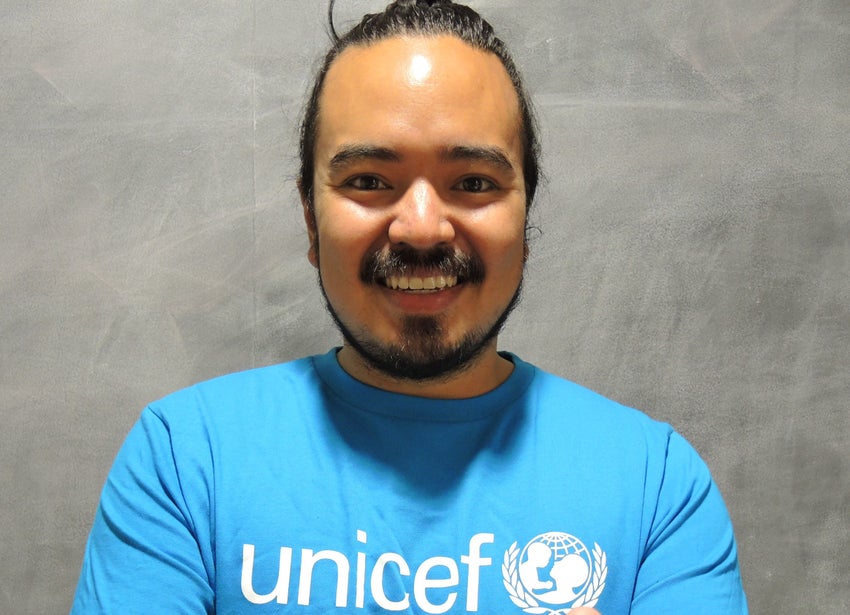 Adam Liaw wearing a UNICEF shirt