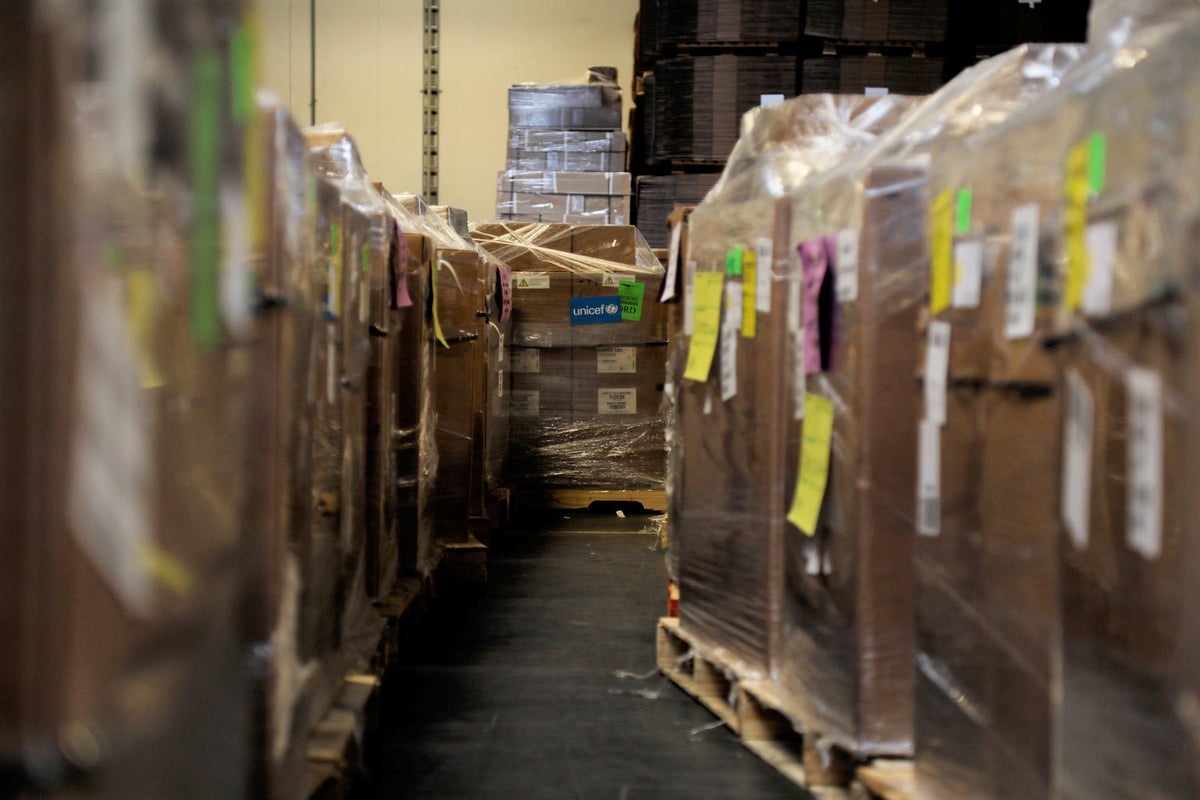 A large group of boxes ready to be shipped inside a warehouse.