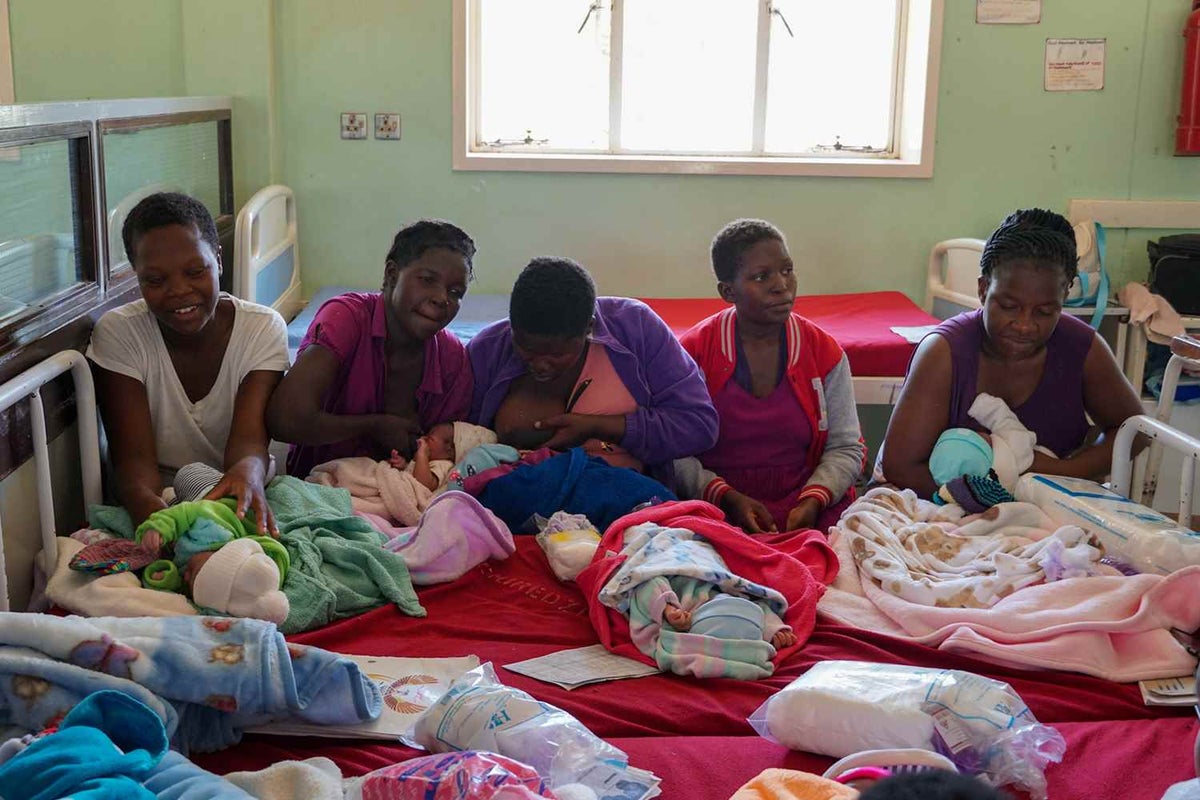 These mothers are attending their final education session on how to wrap their babies and breastfeed safely.