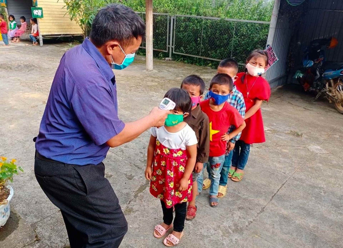 In Vietnam, COVID-19 preventive measures have been taken by teachers and students as they return to school. 