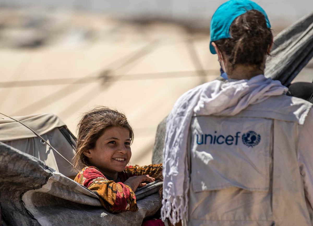 UNICEF distribute clothing to children at Al-Hol camp in northeastern Syria