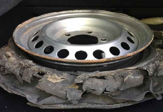 A wheel from one of the UNICEF vehicles after the attack.