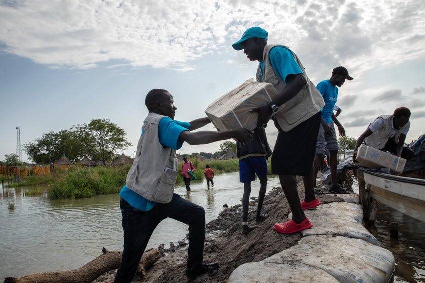 UNICEF workers helping during floods in South Sudan.
