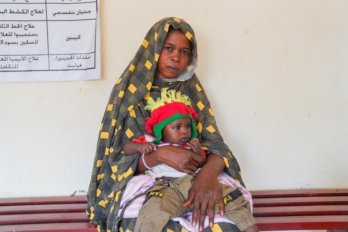 Gisma and her son at a UNICEF-supported health facility in western Sudan.