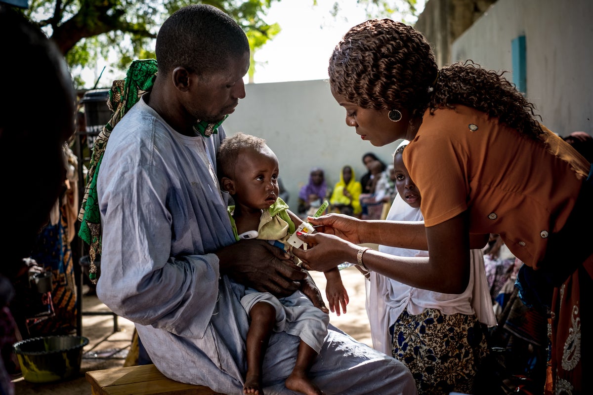 A child being screened for malnutrition