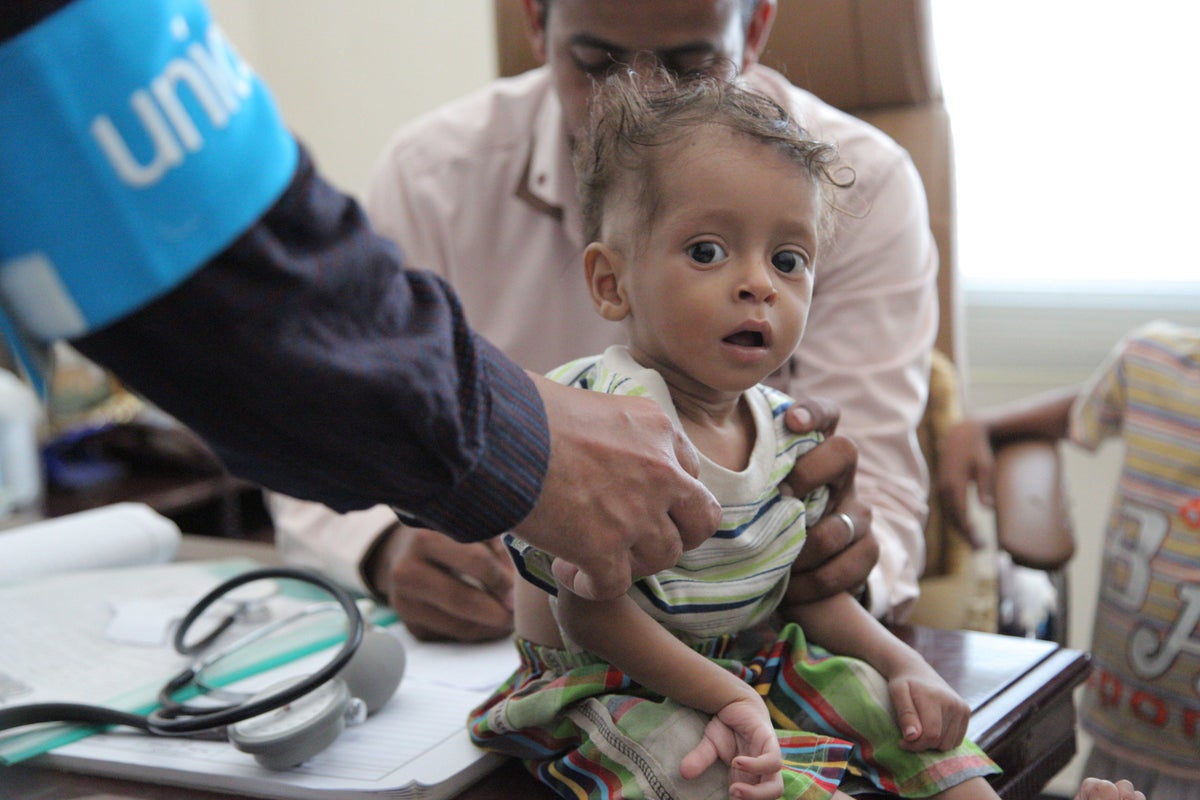 Child being screened for malnutrition, Yemen