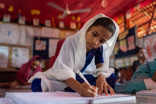 Young girl in a classroom at a Rohingya Refugee Camp in Cox's Bazar, Bangladesh.