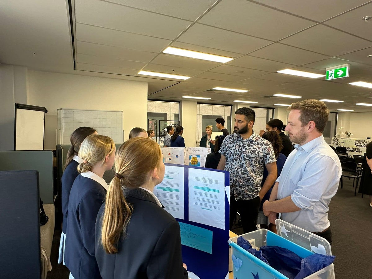 Students presenting to the UNICEF Australia team