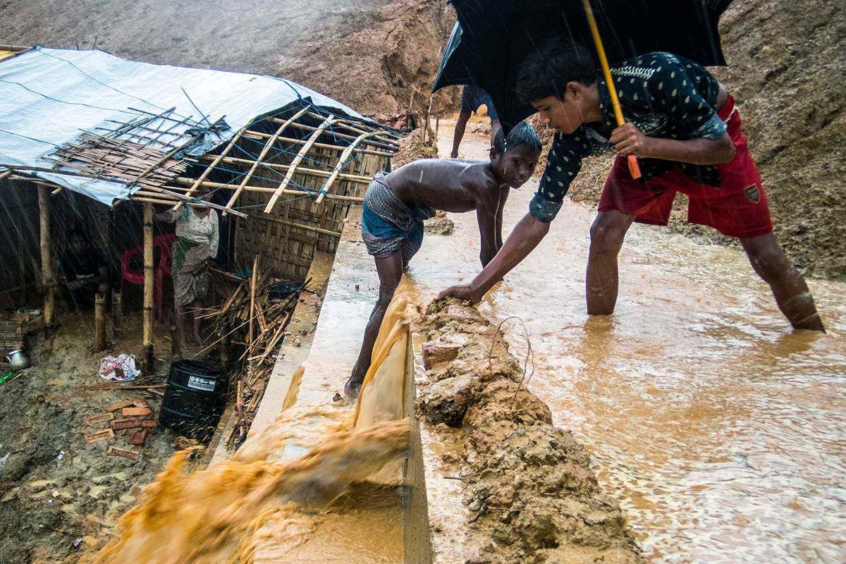 Intense rains have already begun to inundate the Rohingya refugee camps, causing landslides, damaging hundreds of shelters and turning hills into quagmires.