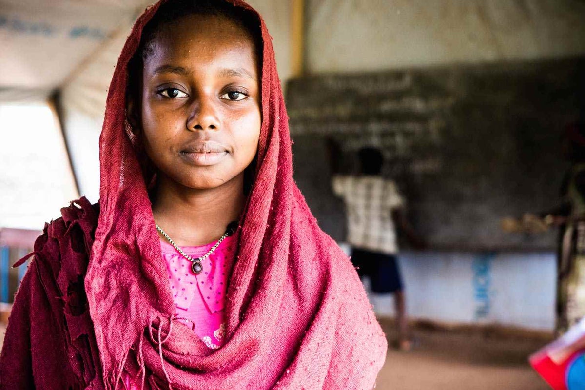 Faozea says she feels comfortable going to school thanks to UNICEF-supplied dignity kits which help her keep her clothes clean for class