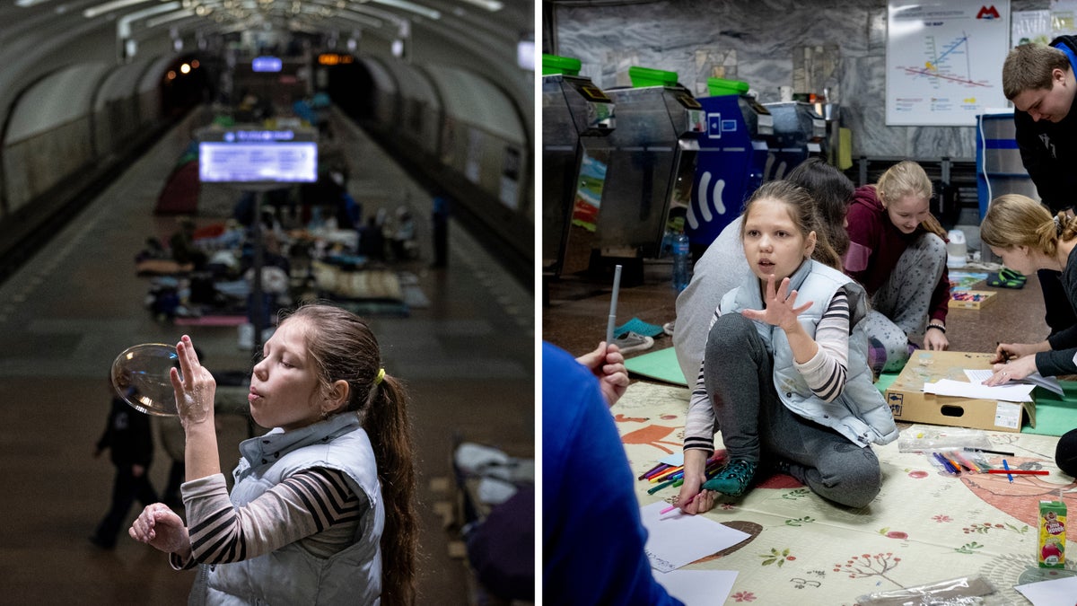 A young girl plays with bubbles and learning supplies provided by UNICEF in a Ukrainian underground bunker.