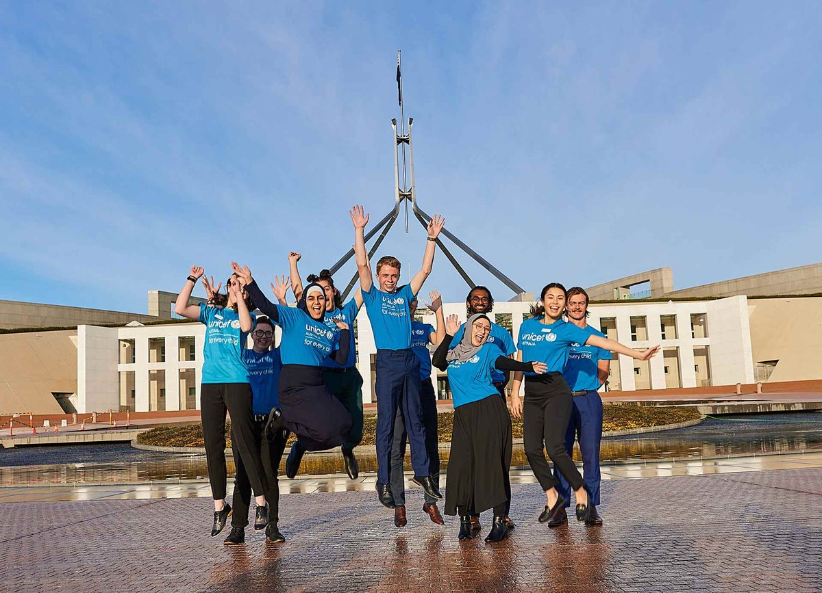 UNICEF Australia's Young Ambassadors celebrate outside Parliament House. 